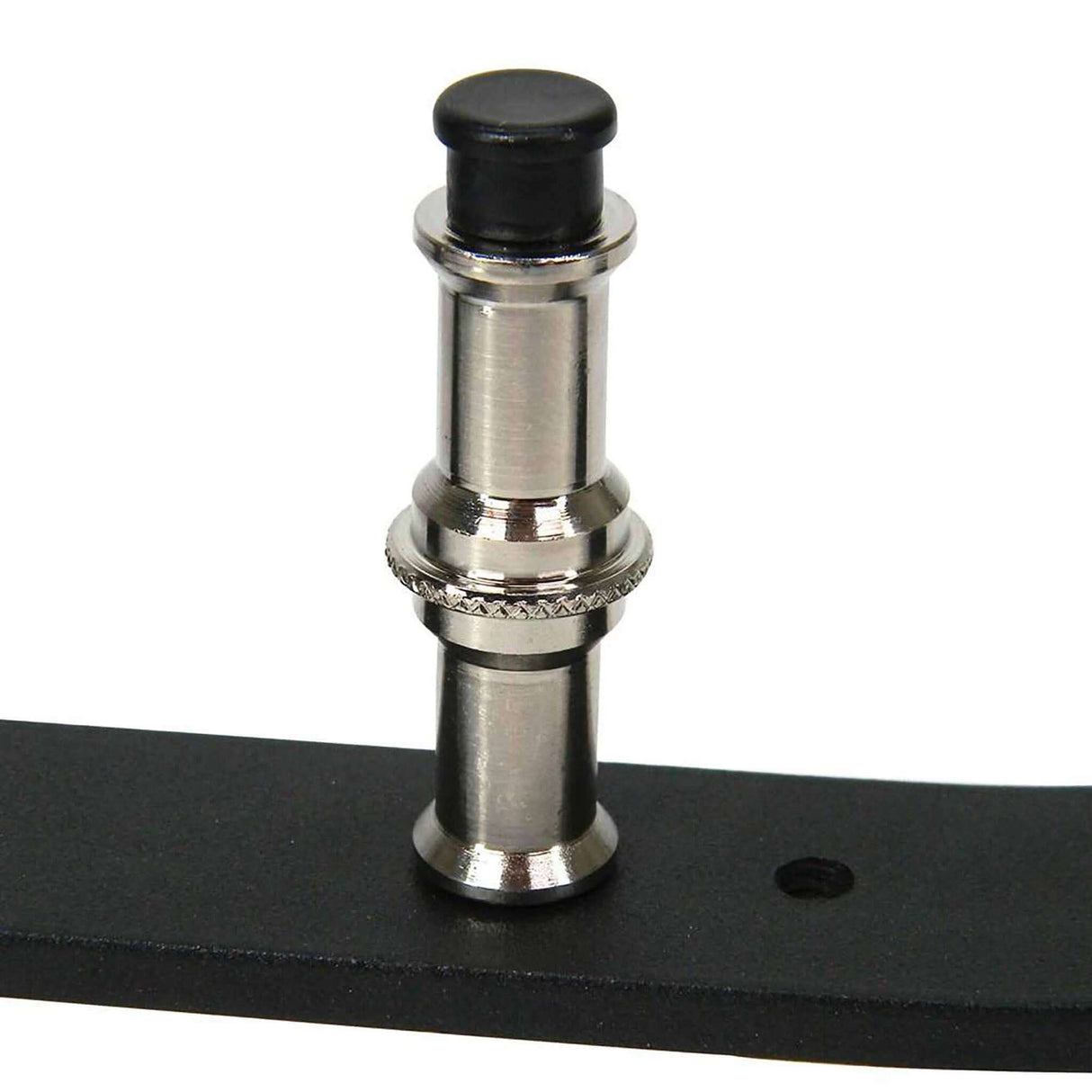 Interchangeable 5/8" pin for Matthews Back Light Stand on black surface