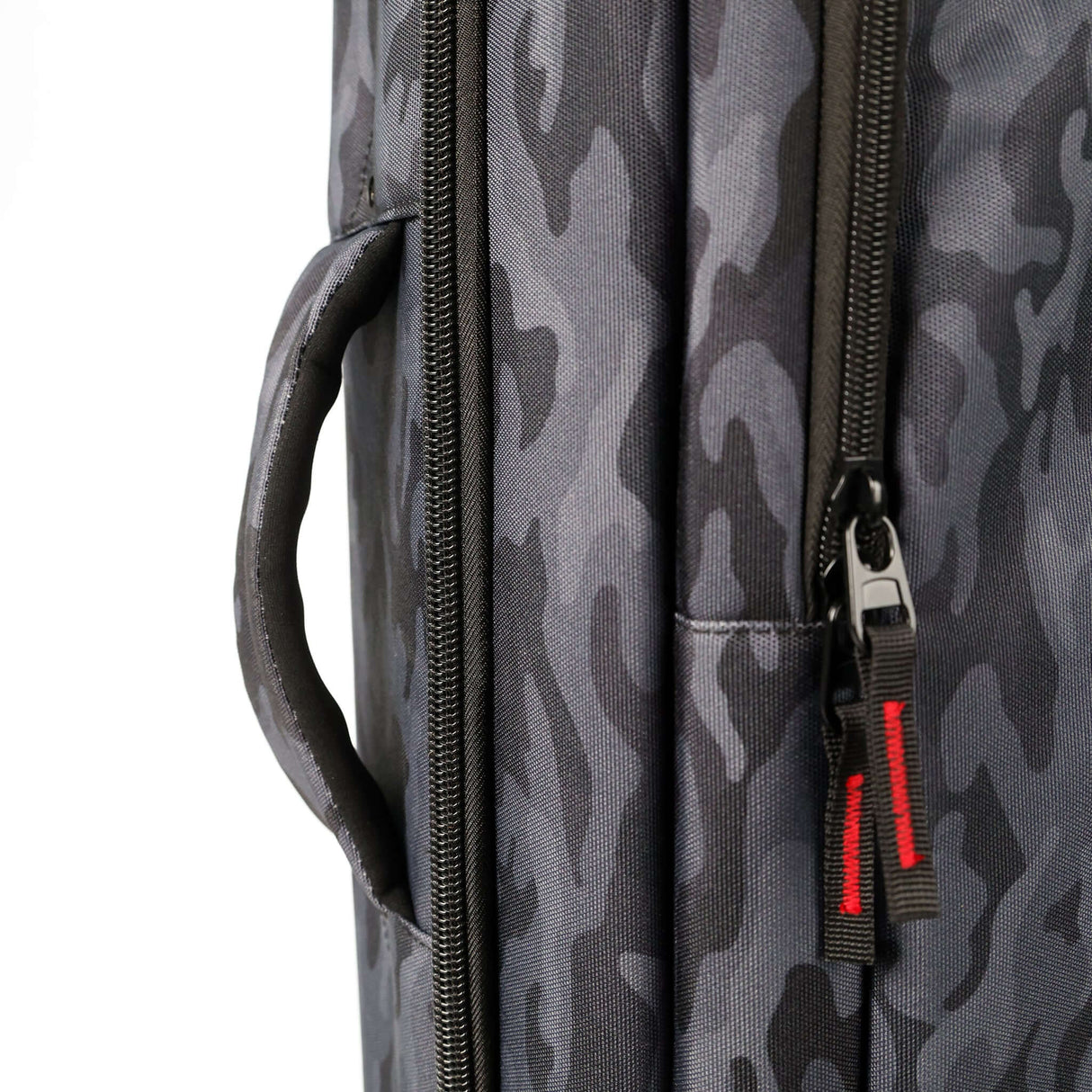 Close-up view of the exterior zipper and handle of the Rolling C+Stand Kit Bag Greyscale Camo Edition.