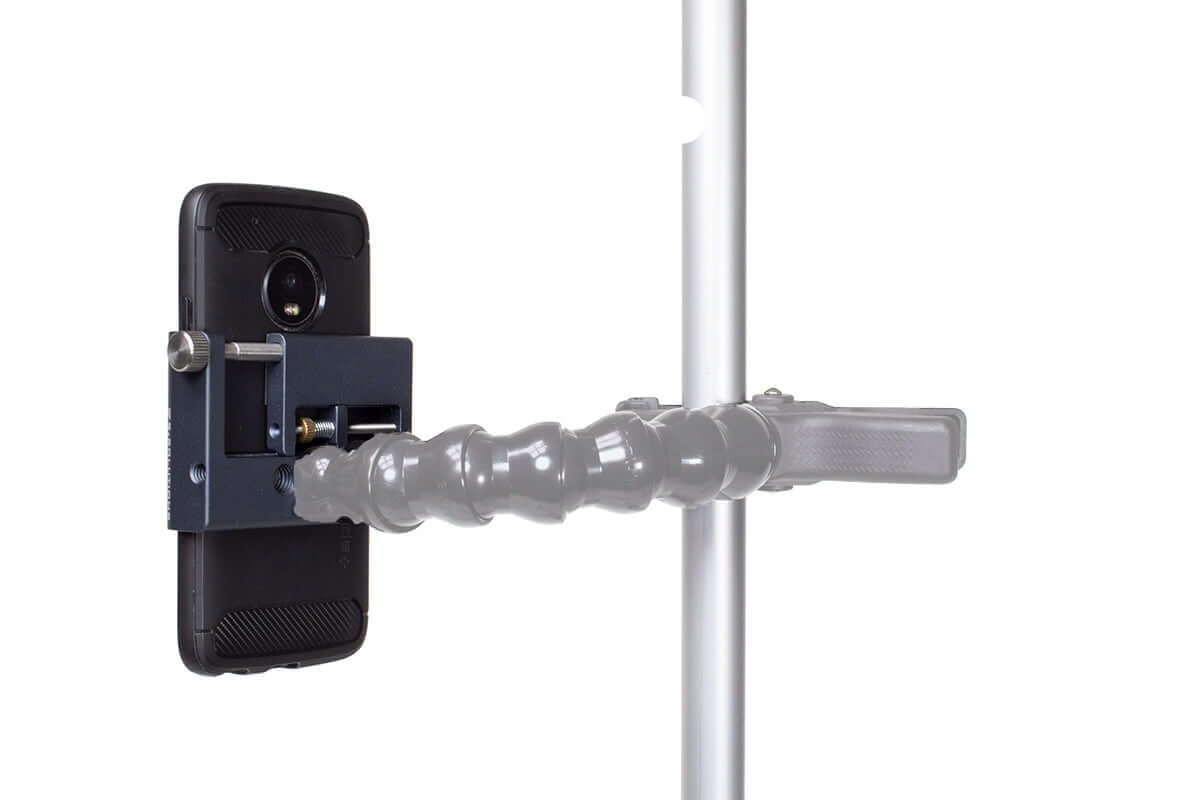 Phone Grip for Dinkum securely holding a smartphone with flexible arm, ideal for field viewing and stability.