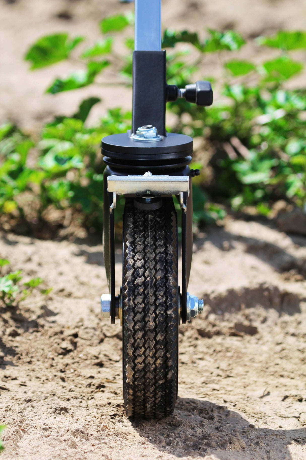 Big F’ing™ Wheel viewed from the front, showcasing the durable foam tire and metal support on a smooth surface.