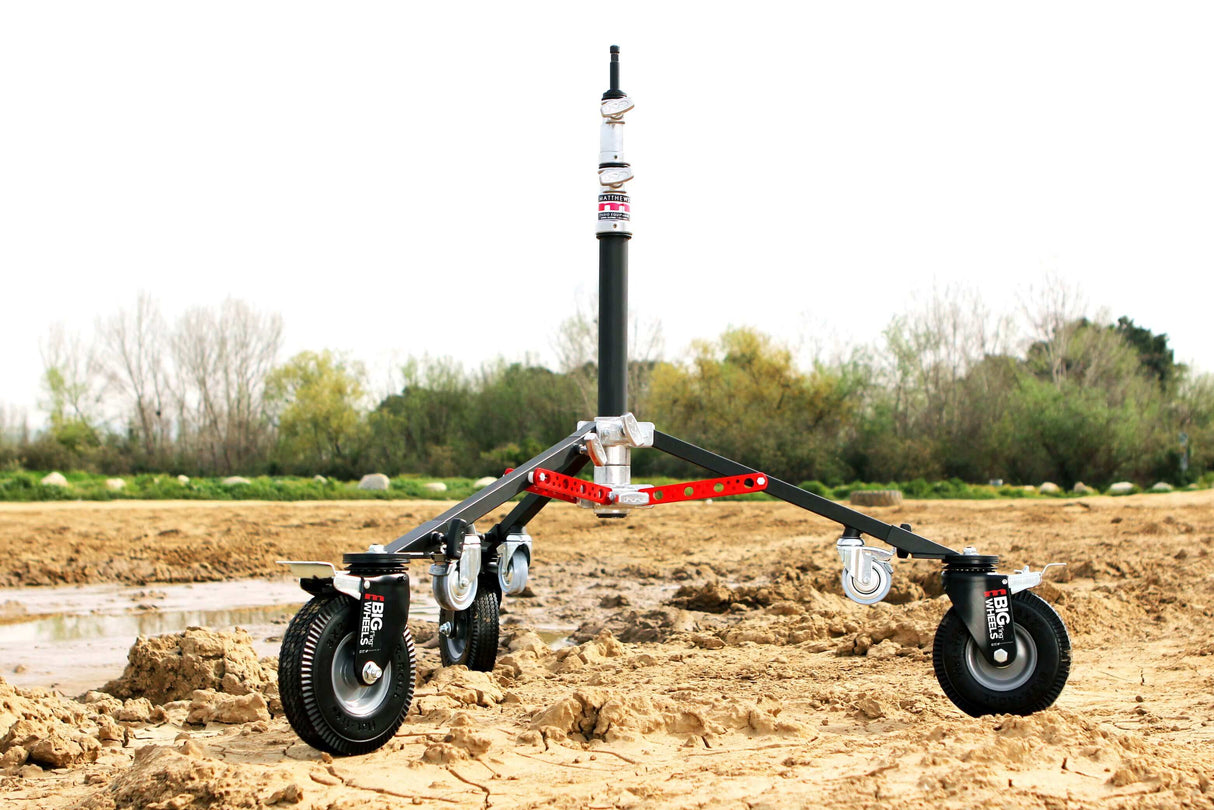 Big F’ing™ Monitor Wheel Set with foam semi-pneumatic tires on a film production set in a natural outdoor environment.