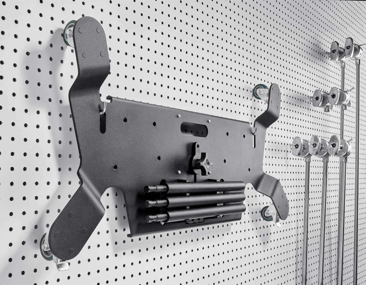 Gatorbuddy stable steel base with Tente caster wheels mounted on perforated wall