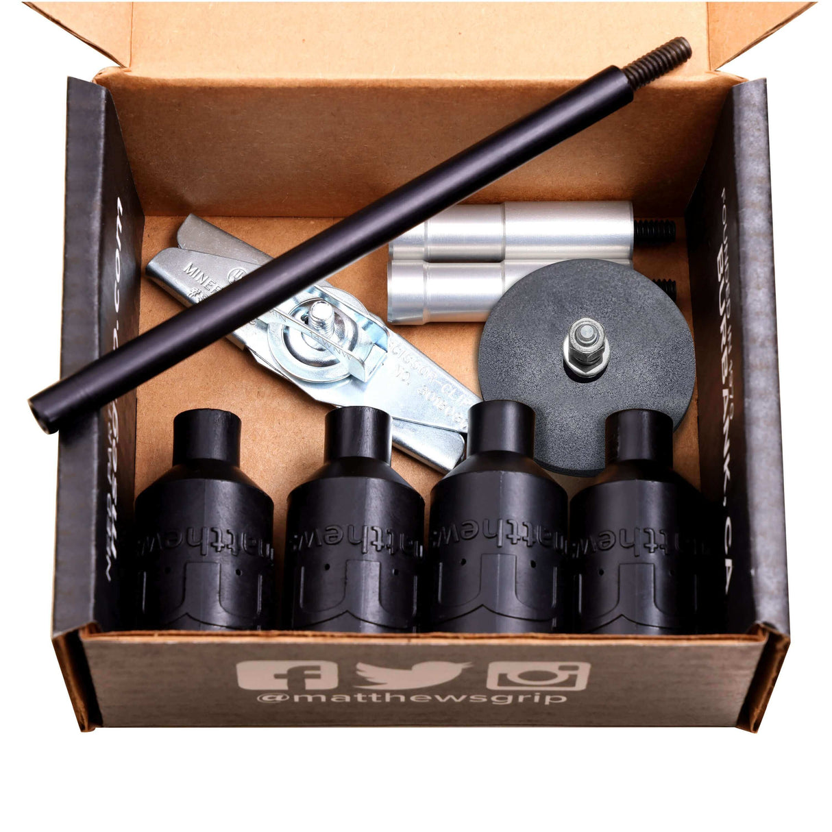 BM1® Bulb Mount Kit components including threaded pins, scissor clamp, and various mounting pieces in a branded box.