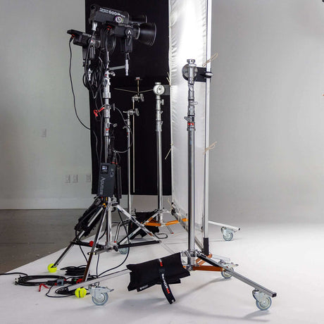 Studio equipment featuring flexible stands and lighting setup for professional photography work.
