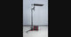 Monitor Stand III shown with monitor mounted, extending and folding to compact mode