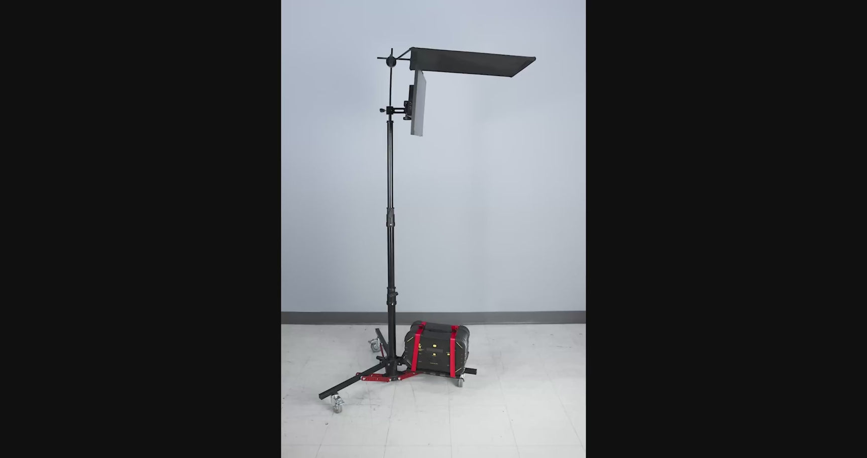 Monitor Stand III shown with monitor mounted, extending and folding to compact mode
