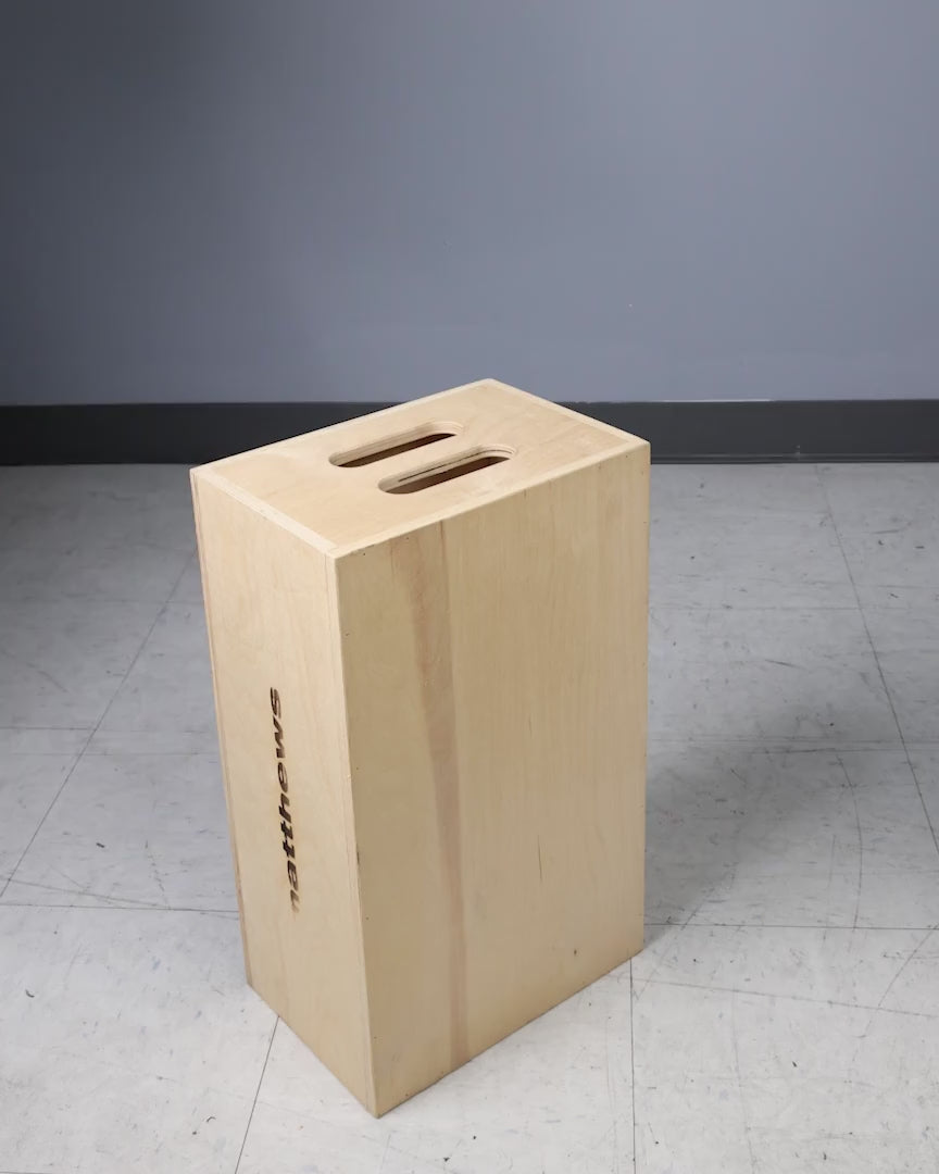 Apple Box Topper shown connecting and carrying a stack of apple boxes