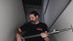 Grip Rail with wall spreader ends tensioned between two walls in a hallway, showing the pressure pads and adjustment