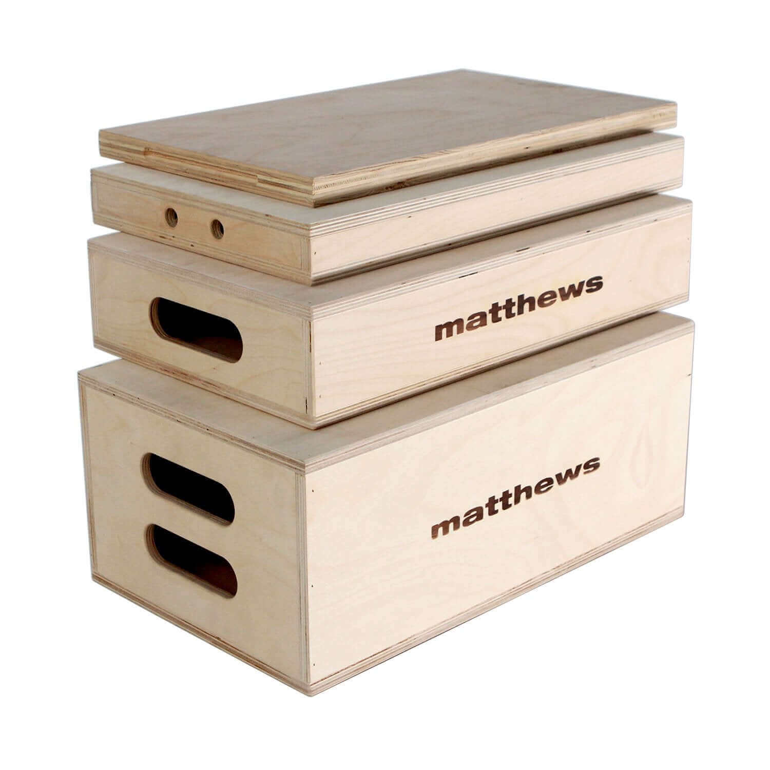 Stack of wooden Apple Boxes used for propping, leveling, sitting, or standing by Matthews.
