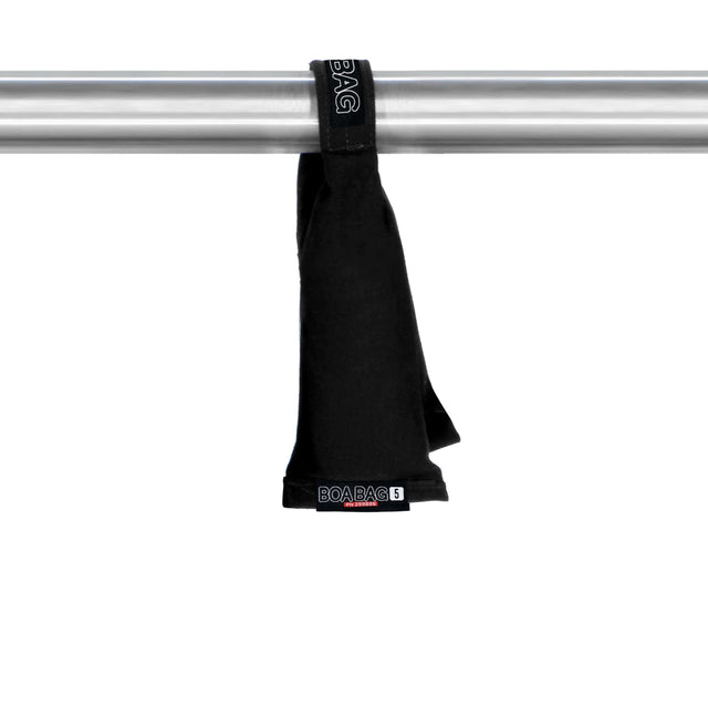 BOA BAG hanging on a steel pole, 5 lbs (2.3 kg) weight, designed for securing equipment and stands.
