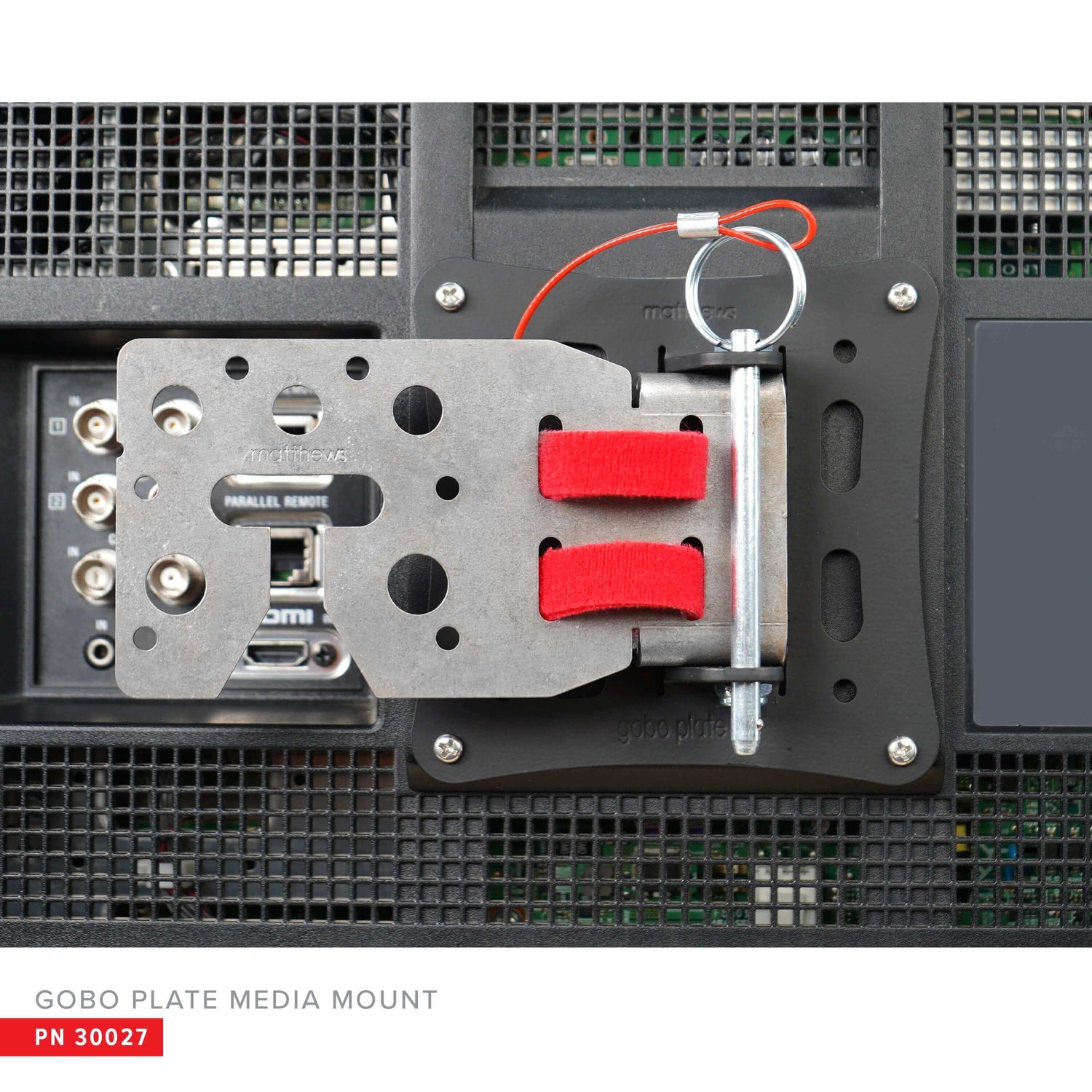 Gobo Plate Media Mount securely attached to a monitor, featuring adjustable straps and a durable metal design for easy setup.